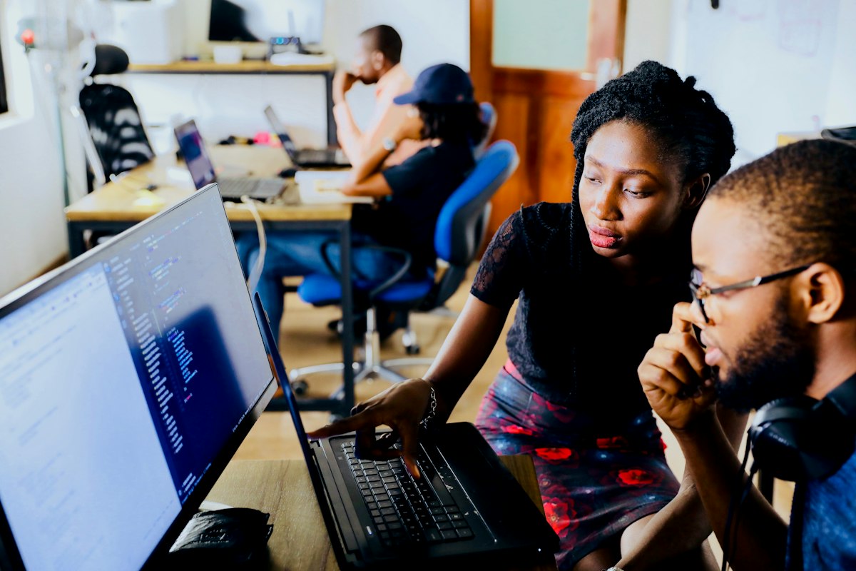 An instructor working through a problem with a learner